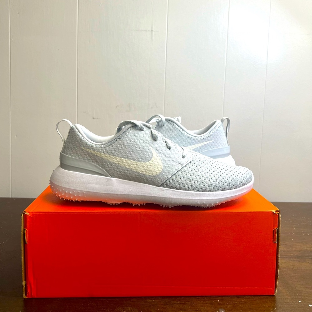 Brand new pure platinum Nike Rosches for women